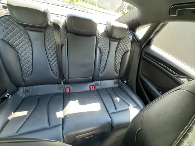 Black diamond-stitched leather rear seats inside the Audi RS3